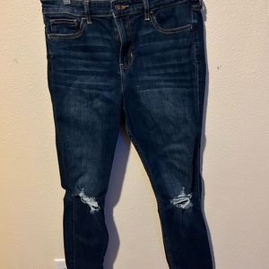 Dark wash jeans with rips in the knees Size 6